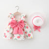 A pink baby girl summer dress and sunhat set featuring floral print and bow details.