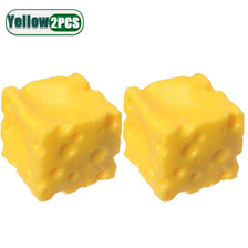 Two yellow cheese wedge squishy stress relief toys