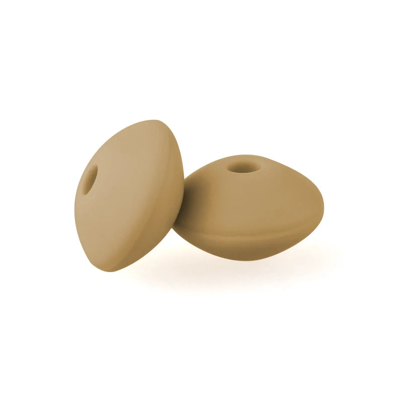 A pair of smooth, tan silicone lentil beads shaped like an abacus for jewelry making.
