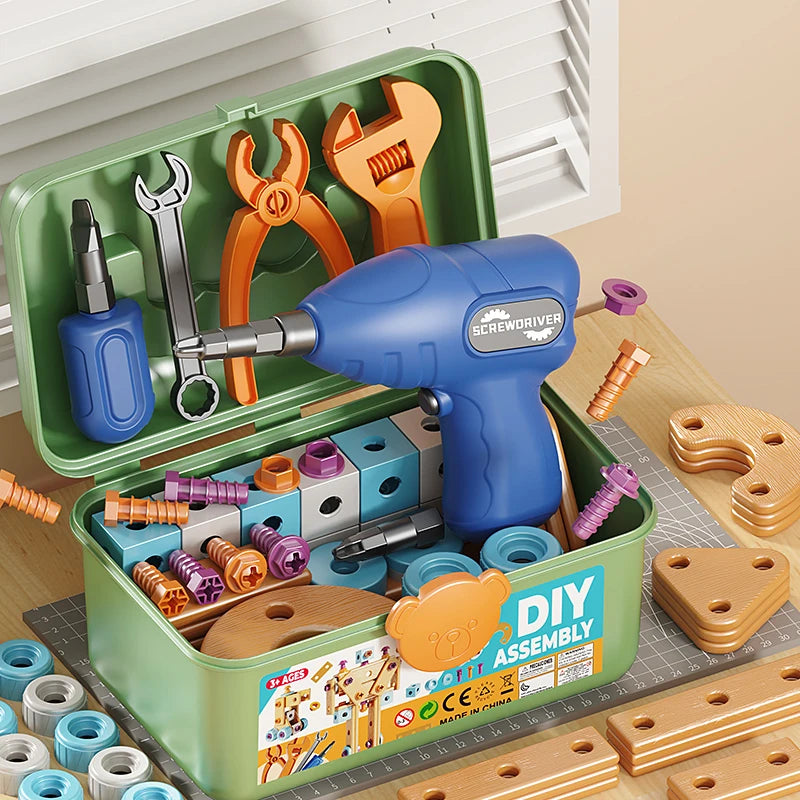A green box containing a DIY assembly kit with tools and wooden parts for a nut hand disassembly puzzle.
