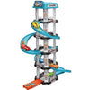 A multi-level race car track set featuring a parking garage and various levels for racing cars.