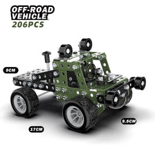 A green off-road vehicle model made of metal building blocks with large tires and an excavator-like structure.