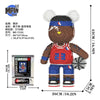 A micro building block kit shaped like a bear featuring a black and white face and red clothing.