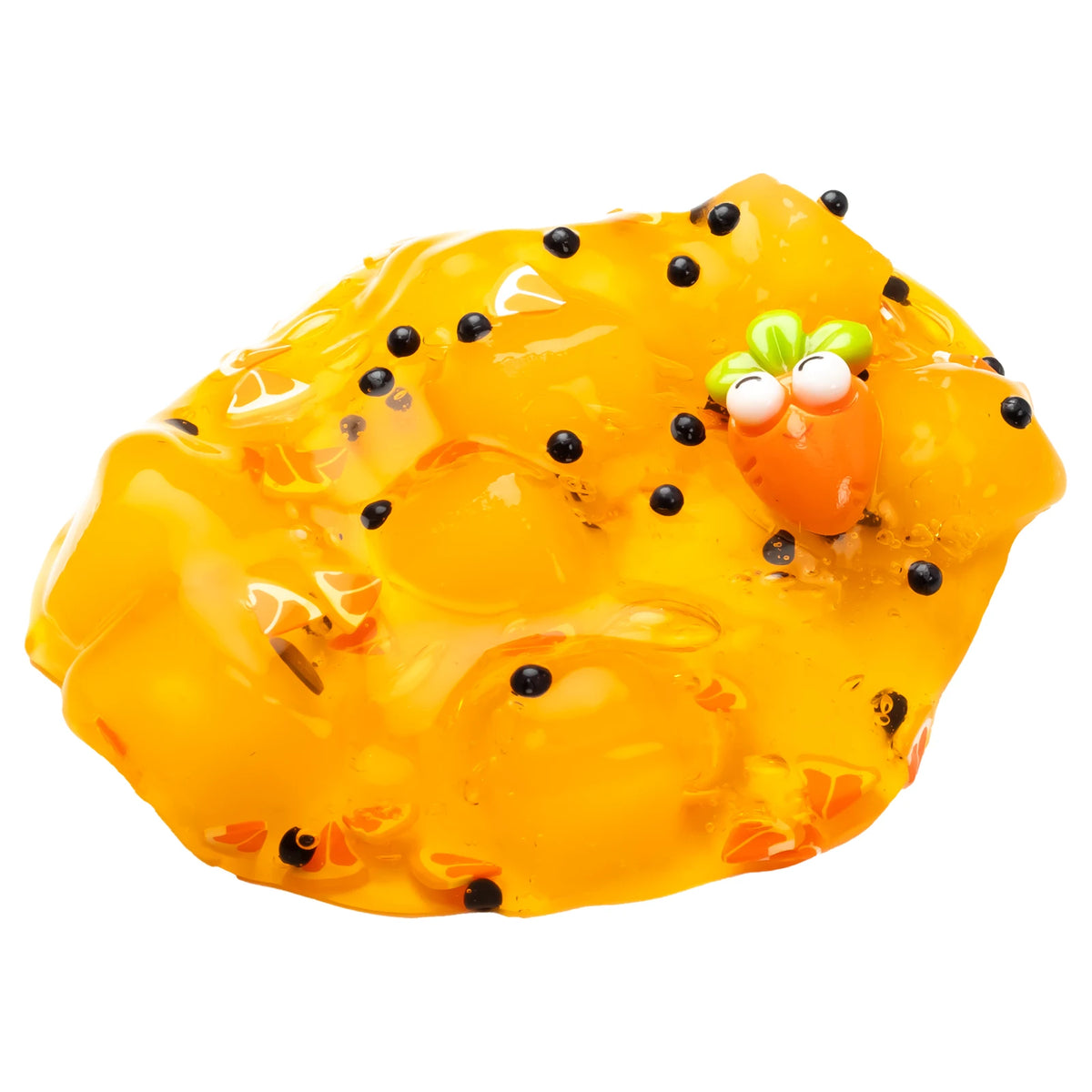 A bright yellow jelly putty with black specks and a green, cartoonish face on top.