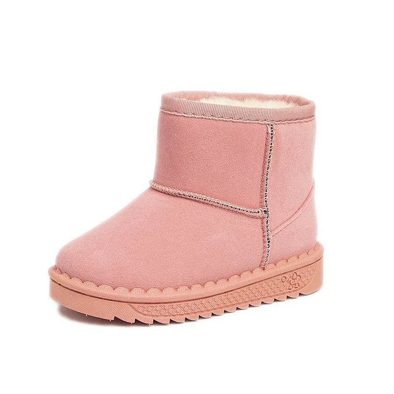 A pair of pink, cozy fur-lined winter boots with a slip-on style.