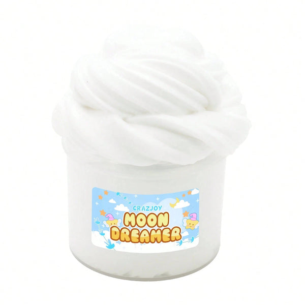A white jar of moon dreamer slime with a swirl of white foam on top.