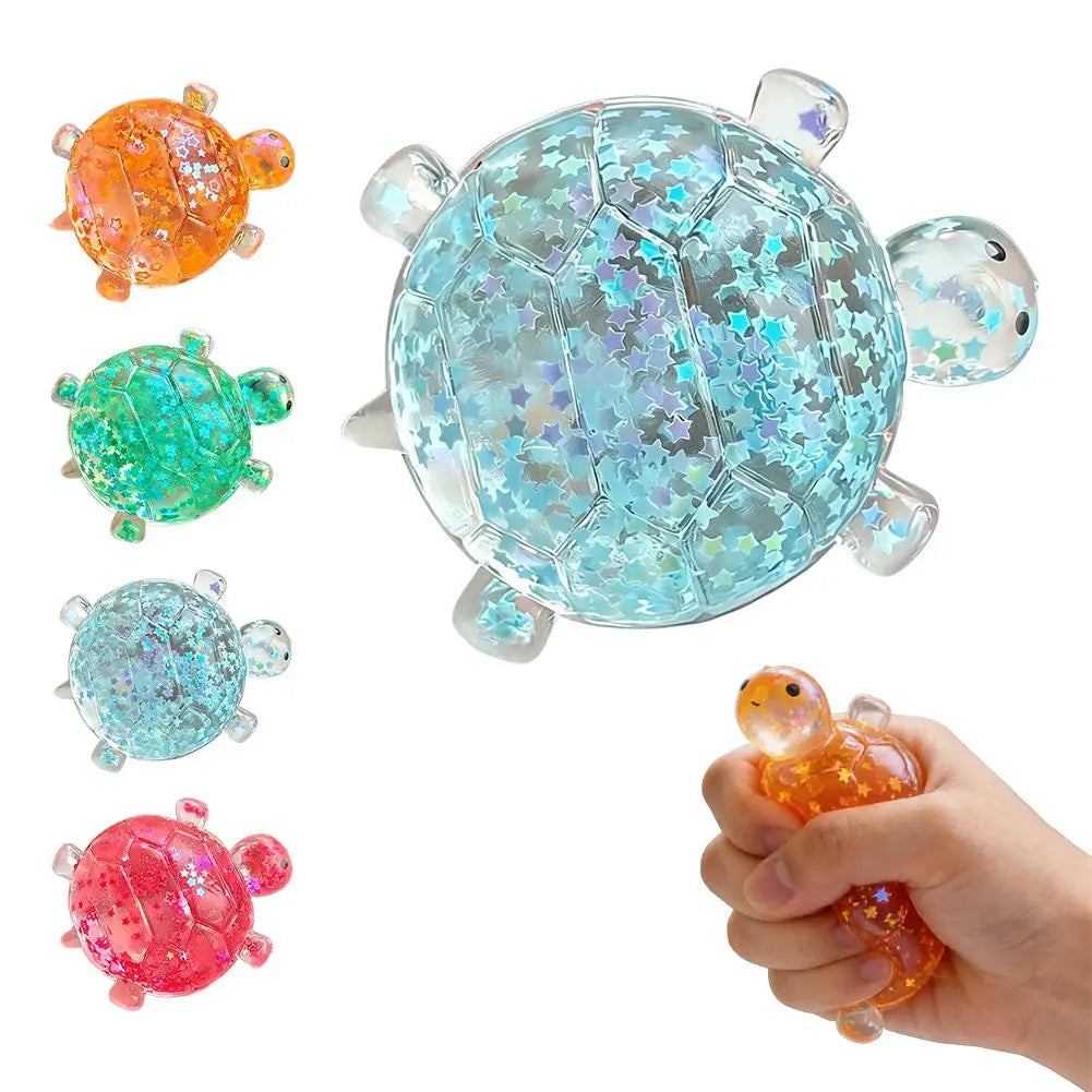 A collection of colorful squishy star turtle fidget balls, including orange, green, light blue, and pink varieties.