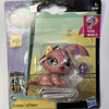 A packaged figure of Fortuna LaChance, a small animal character with pink and purple features.