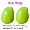 Two bright lime green stress balls showing color change with temperature