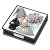 A leather diamond painting kit featuring a detailed illustration of a woman in a crown and elaborate dress.