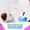 A person writes on a whiteboard using 8-color dry erase markers with chisel tips to demonstrate grammar rules.