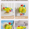 A colorful cartoon baby rattle toy with suction cups shown in various settings like a dining table, bathroom wall, glass wind