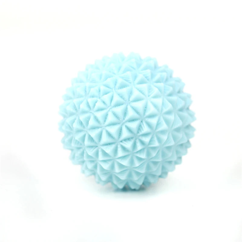 Light blue 3D printed sensory fidget roller keychain with a geometric, diamond-patterned surface.