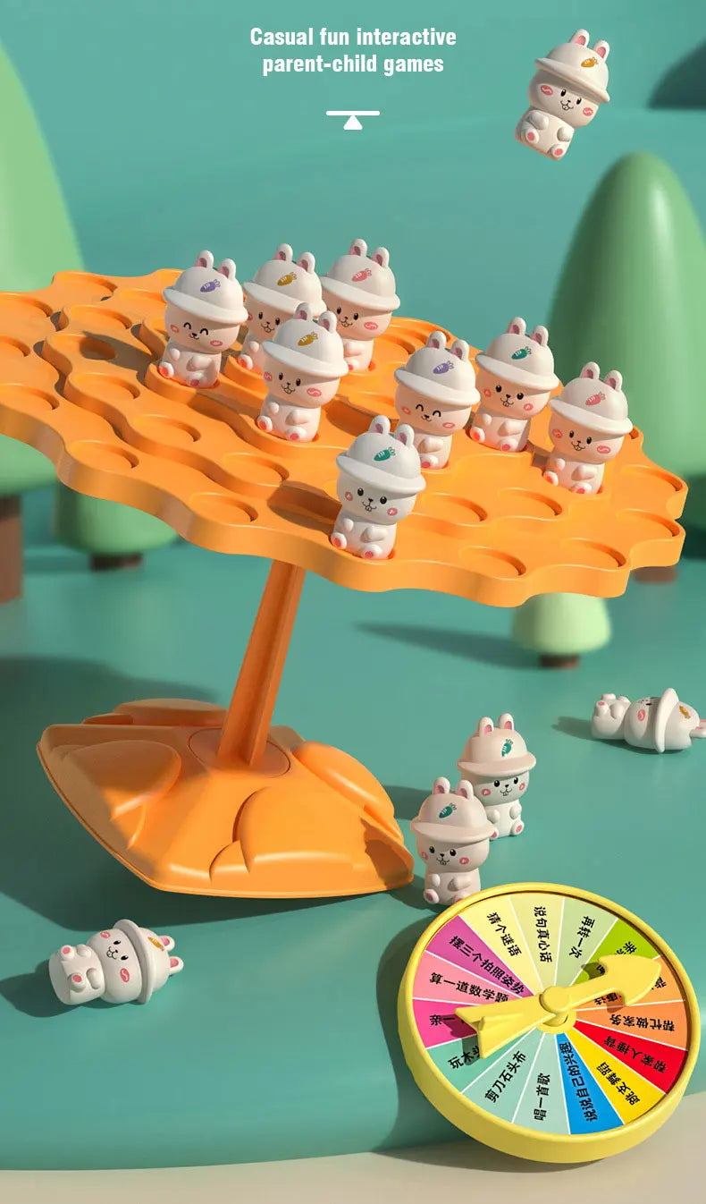 An orange frog balance tree math game with several small frog figures and a yellow spinner.