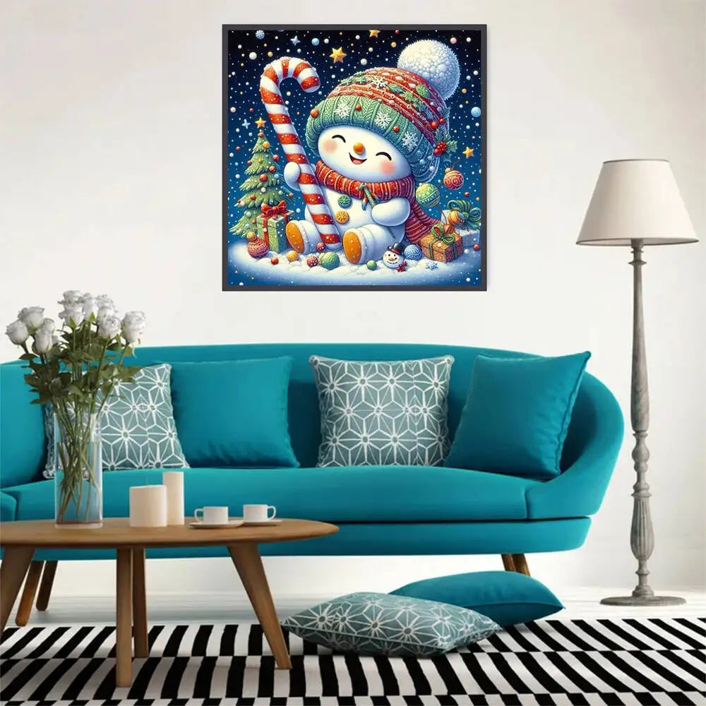 A framed diamond painting featuring a snowman and a Christmas tree against a starry night background.