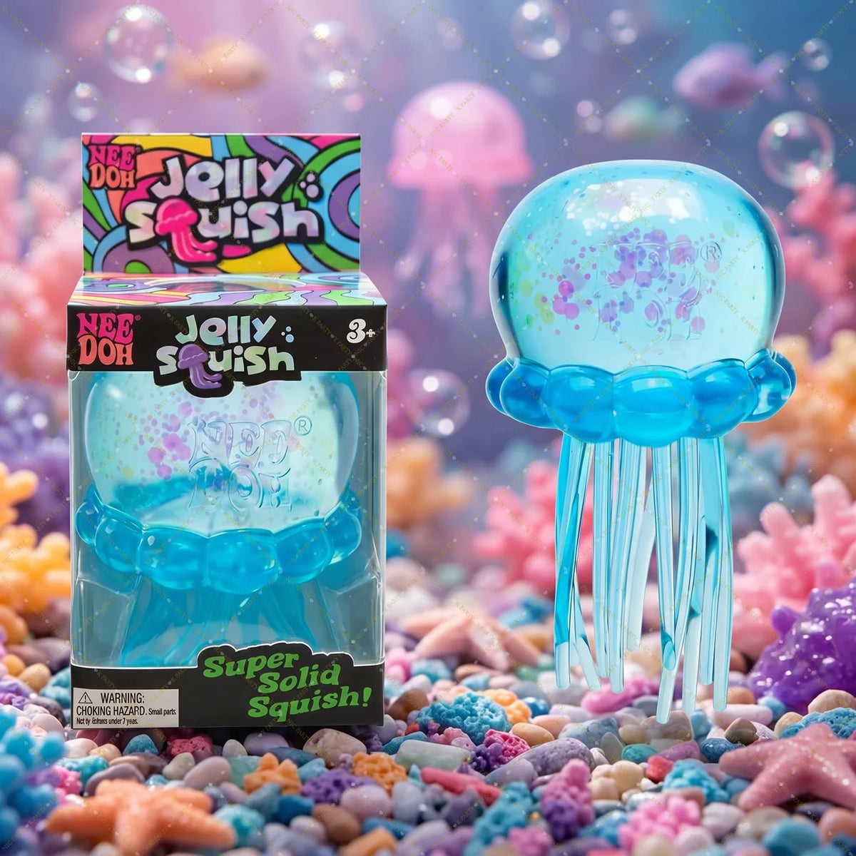 A colorful Jellyfish Squish toy with blue translucent tentacles is displayed amidst sparkling confetti and bubbles.