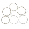A set of six thin, round strings made of nylon and silver-plated copper alloy.