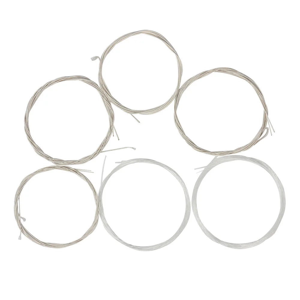 A set of six thin, round strings made of nylon and silver-plated copper alloy.