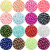 A collection of colorful imitation pearl beads in various shades including yellow, orange, pink, blue, purple, and green.