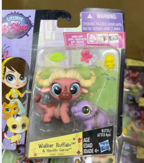 A set of three small pink and purple animal figures from the Little Sleep series packaged in plastic.