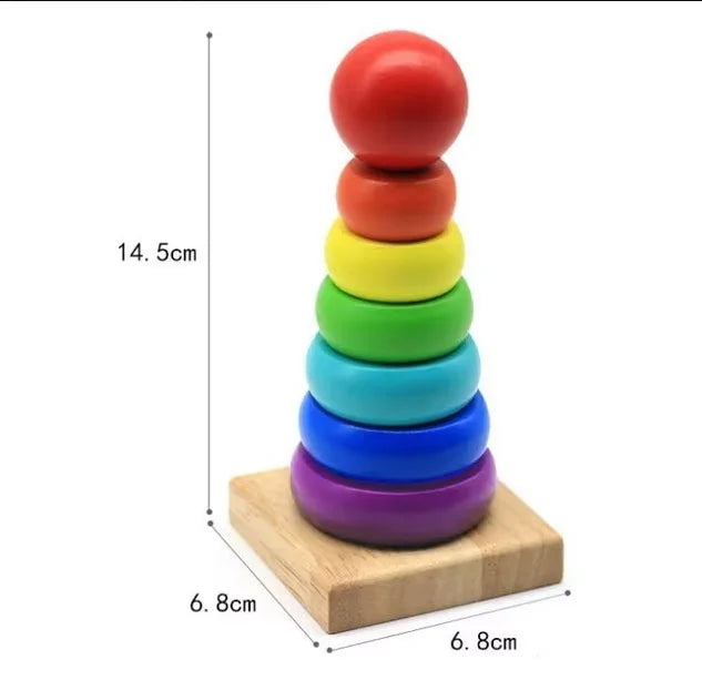 A stack of six colorful wooden rings in rainbow order, used as a Montessori shape and color sorter puzzle for toddlers.