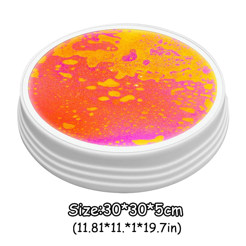 A circular mat with an orange and pink colored surface inside a white container.