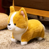 A fluffy yellow and white Corgi plush toy sitting on a beige carpet.