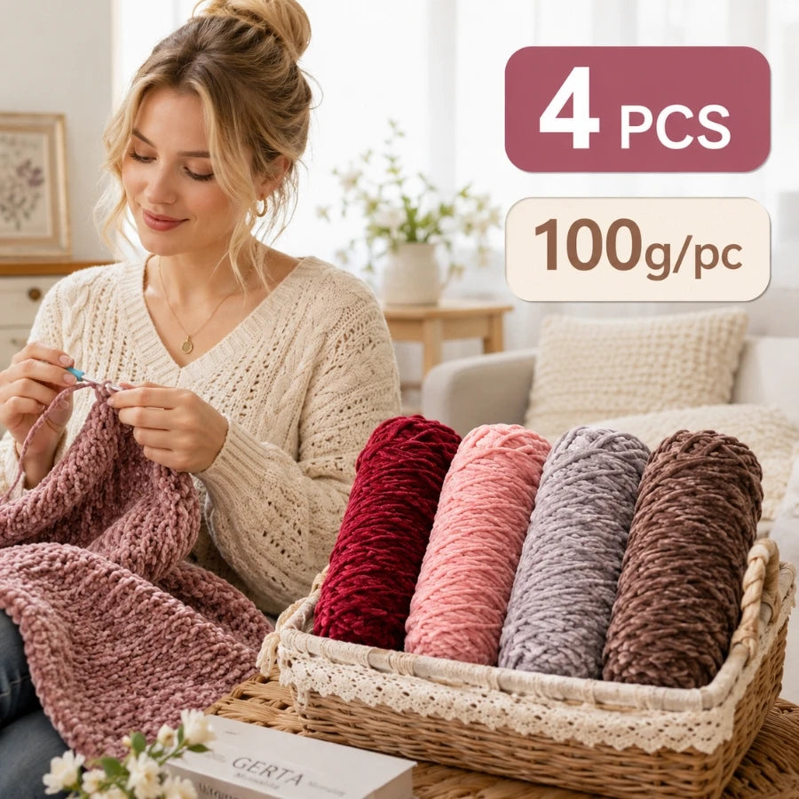 A woman is holding and examining four skeins of soft chenille yarn in various shades of pink, red, and gray.