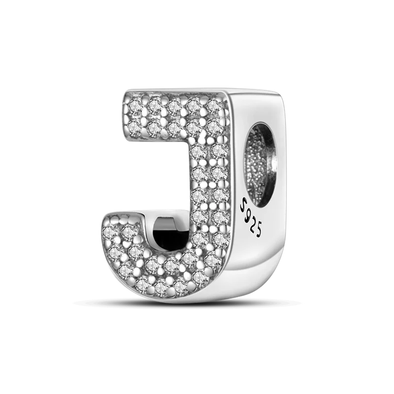 A sterling silver alphabet charm shaped like the letter J, encrusted with cubic zirconia stones.