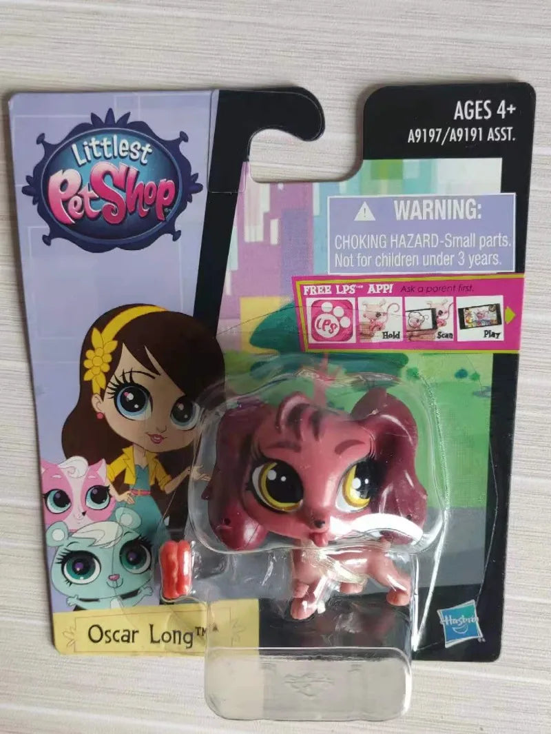 A set of three pink and purple mini posable animal figures from the Littlest Pet Shop line.
