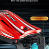 Close-up of a red brushless motor and flexible steering mechanism on an RC racing boat.