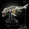 A detailed mechanical model kit of a dragonfly, silver and black, displayed on a stand.