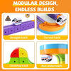 Modular design train set featuring straight, curved, climbing, and run underneath tracks in purple, orange, and green.
