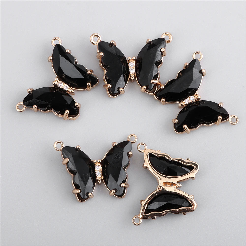 Gold-toned butterfly charm beads with black enamel and clear crystal accents for jewelry making
