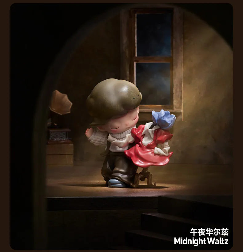A collectible figure blind box of a child dressed in a red dress and white shirt standing on wooden steps.
