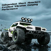 A white and green 1:18 scale off-road RC monster truck driving through water.