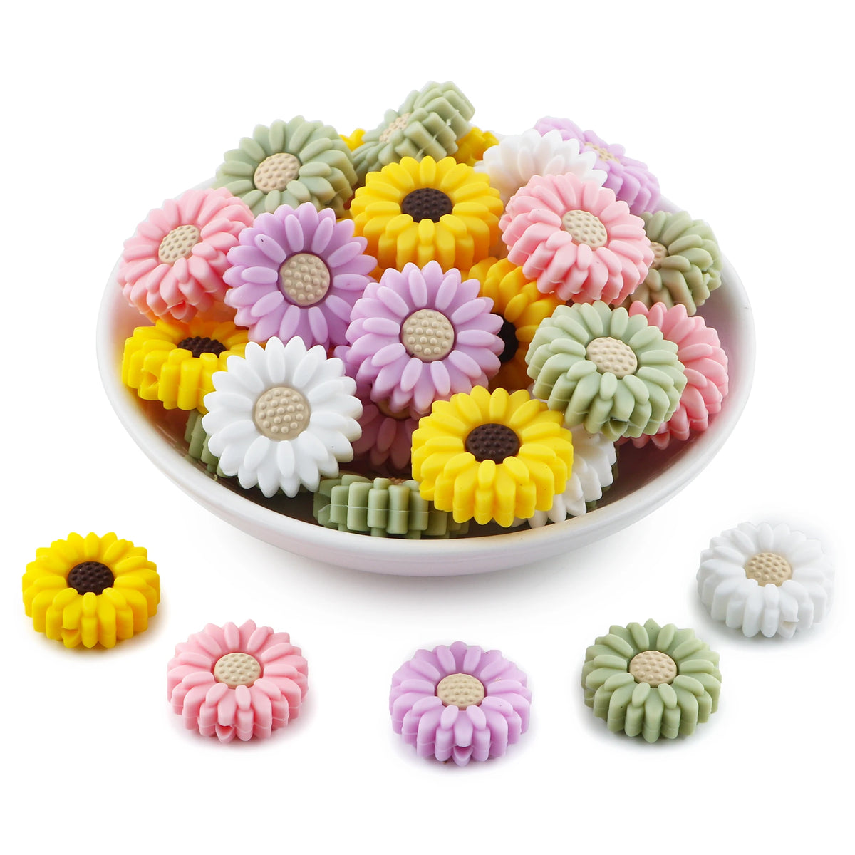 A bowl filled with various colored silicone daisy sunflower beads in pink, purple, yellow, and green.