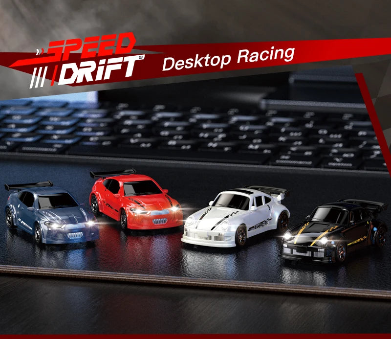A collection of four 1:64 scale RC drift cars in various colors and finishes displayed on a dark surface.