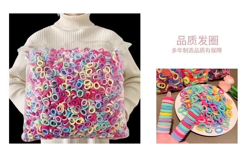 A multi-pack of colorful nylon hair ties in various shades of pink, blue, and green displayed against a white turtleneck swea