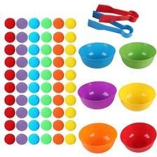 A set of colorful pom-poms in various colors and sizes for counting and sorting toddlers