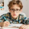 A child is using a colorful rope fidget toy to relieve stress and explore emotions.