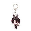Acrylic keychain featuring a cute anime character with black hair and pink accents.