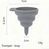 Gray silicone trumpet funnel with a 7cm opening and 6.3cm height, weighing 12g.