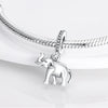 A sterling silver elephant charm bead attached to a silver chain, displayed on a white surface.