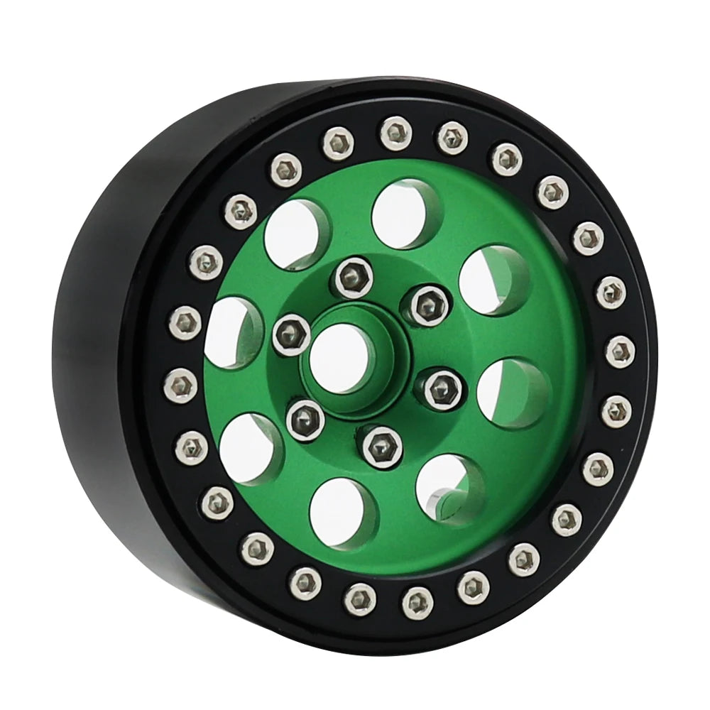 Black beadlock wheels with a green center and removable hex hub for an RC crawler.