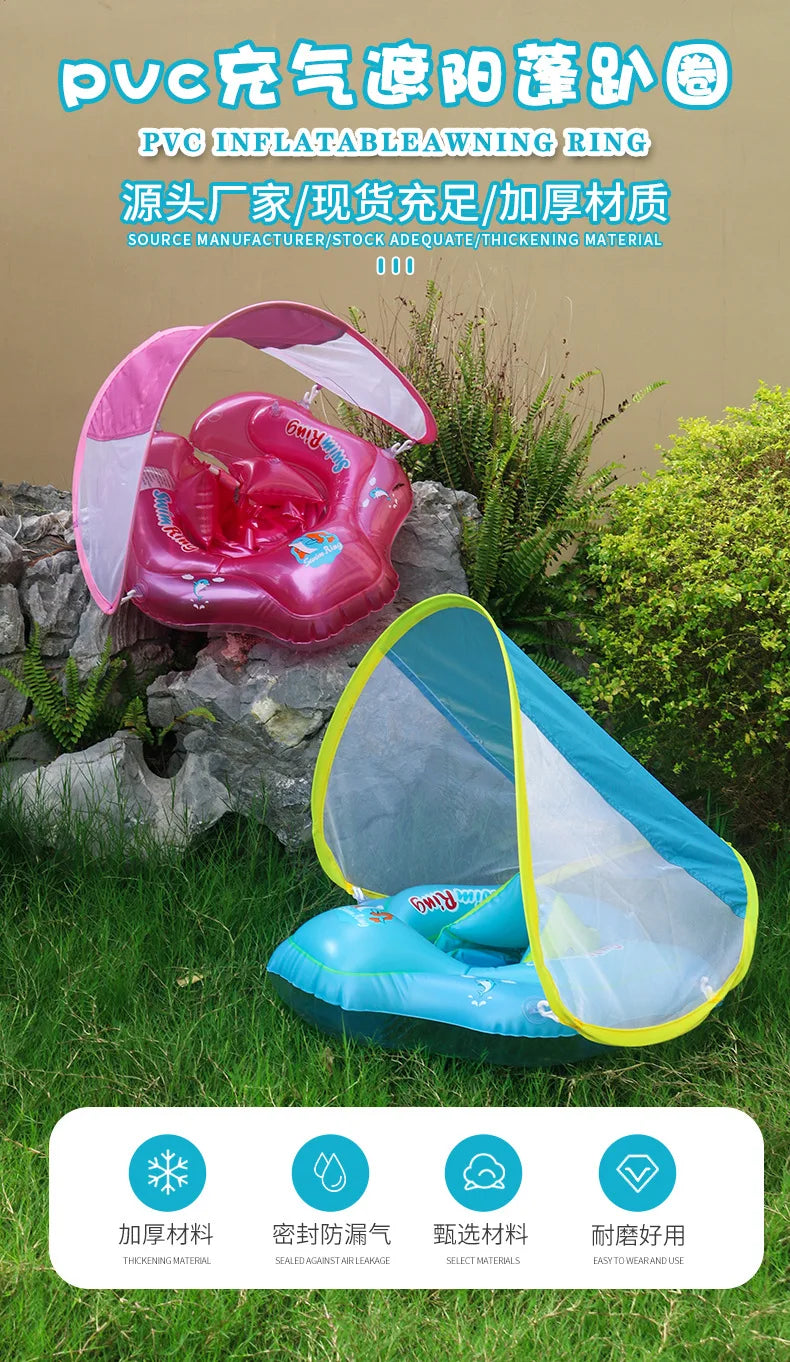 Pink inflatable baby seat ring with a clear sunshade canopy resting on green foliage.