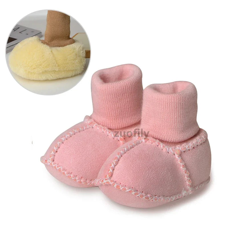 Pink suede baby booties with plush fur lining shown next to a close-up of the fuzzy lining.