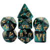 A set of seven elegant polyhedral dice in a dark teal color featuring Roman numerals for tabletop role-playing games