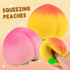A close-up of squishy peaches in pink and yellow colors, showing various shapes and textures.