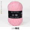 Pink milk cotton yarn skein labeled 10# 粉红 in a black box.
